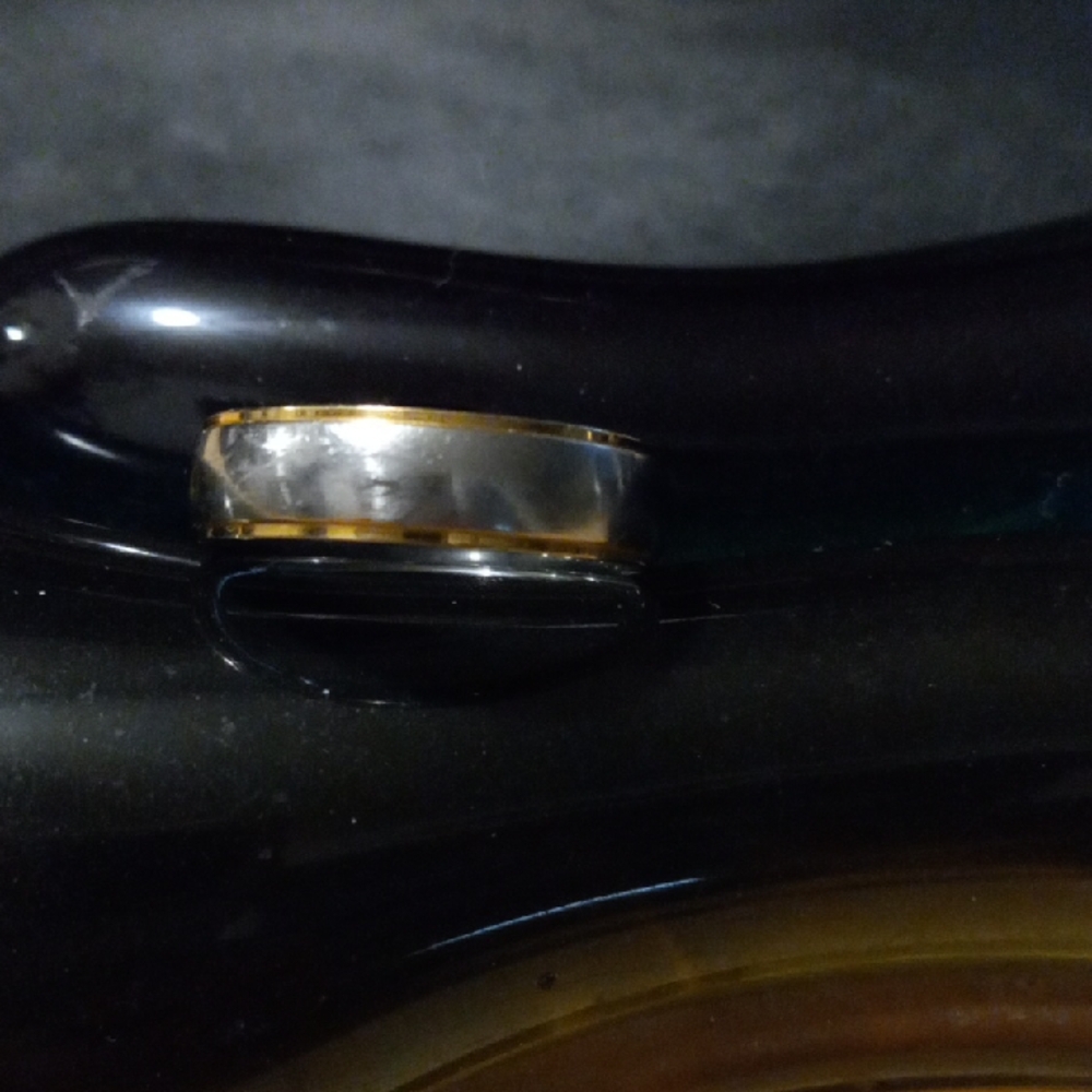 Silver and Gold Accessory, Ring Sz 11 It Is Stainless Steal.